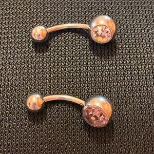 Pink and clean Gem Silver Curved Barbell Navel Rings (2)
Custom Jewelry